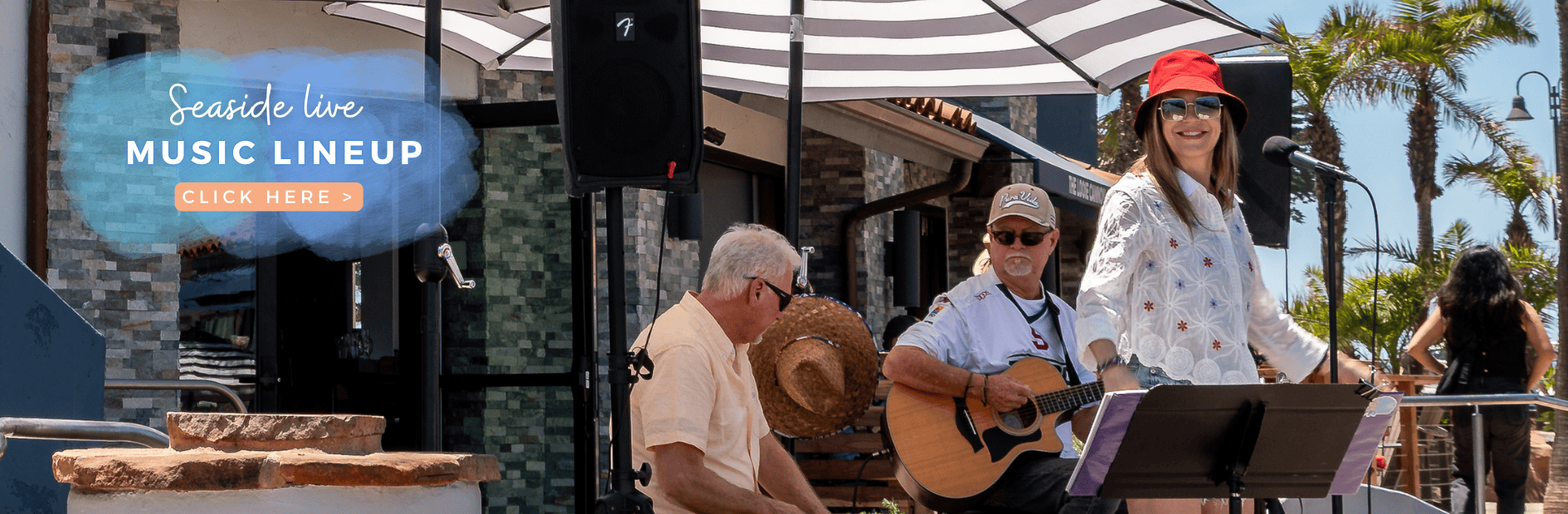 Live music performance at Ventura Harbor Village outdoor patio with musicians and audience.