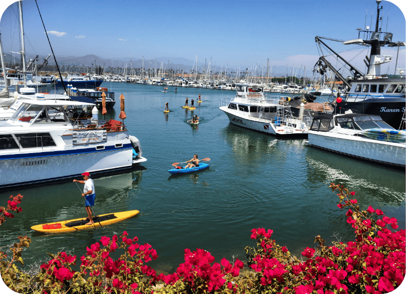Inside Ventura Harbor Village shop with colorful merchandise and displays.