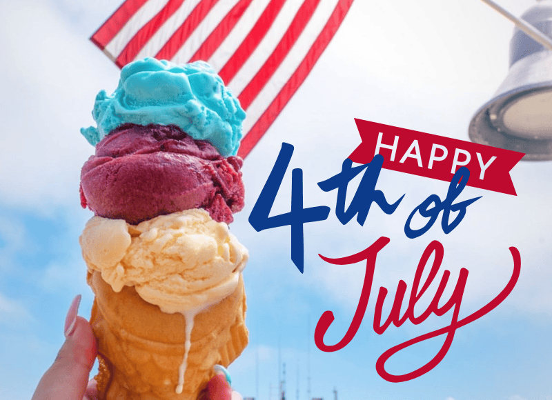 Ice cream cone with three scoops and a patriotic flag for July 4th celebration.