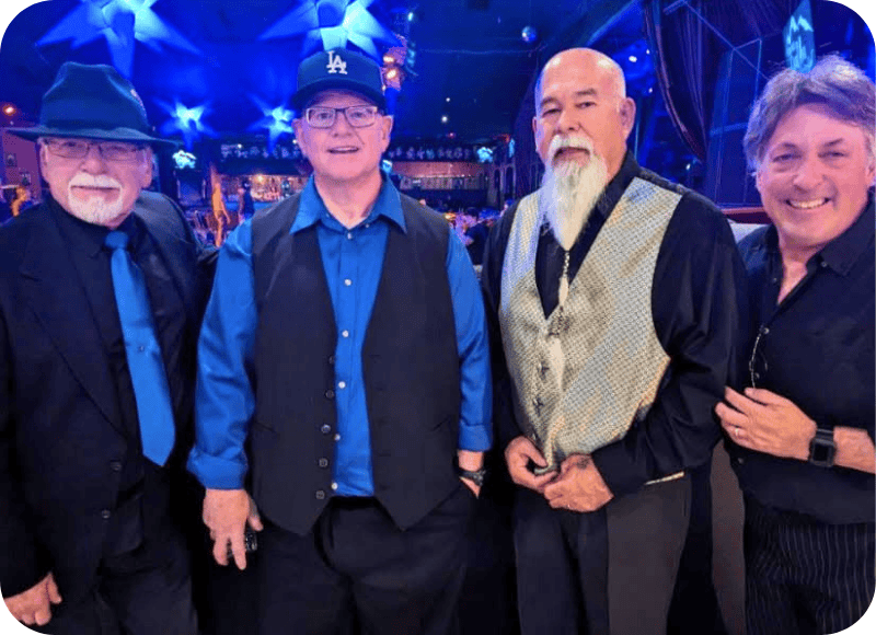 Four musicians performing at Ventura Harbor Village during July 3rd celebration.