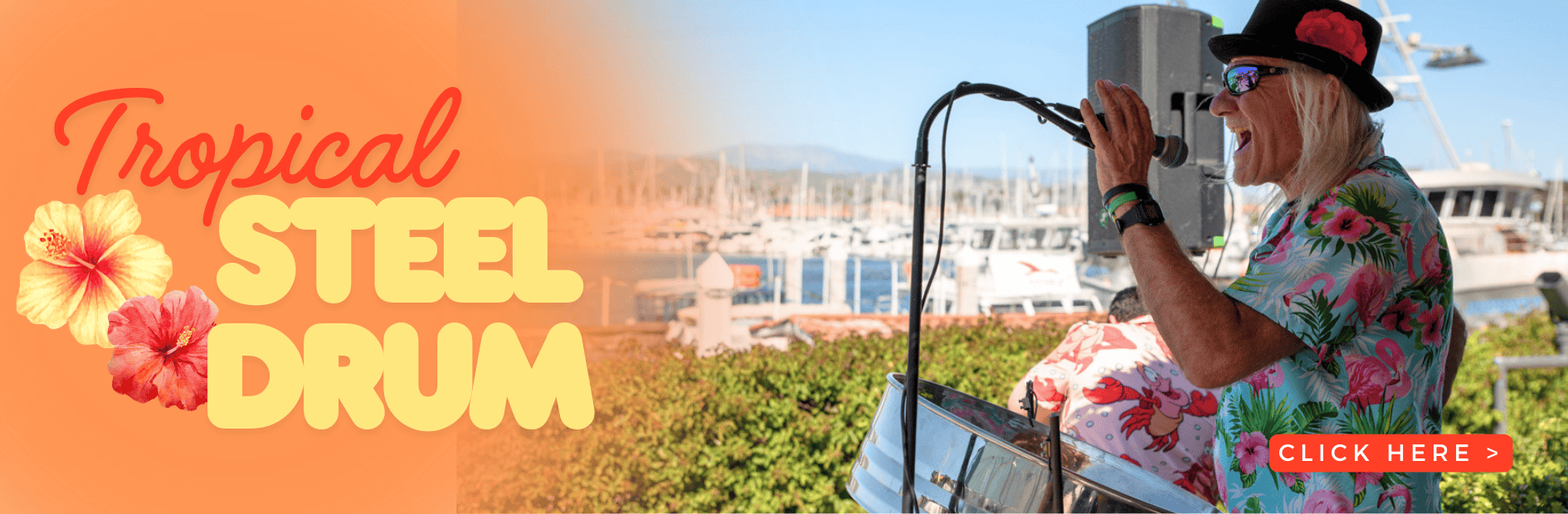Woman playing steel drum at Ventura Harbor Village with boats in background.