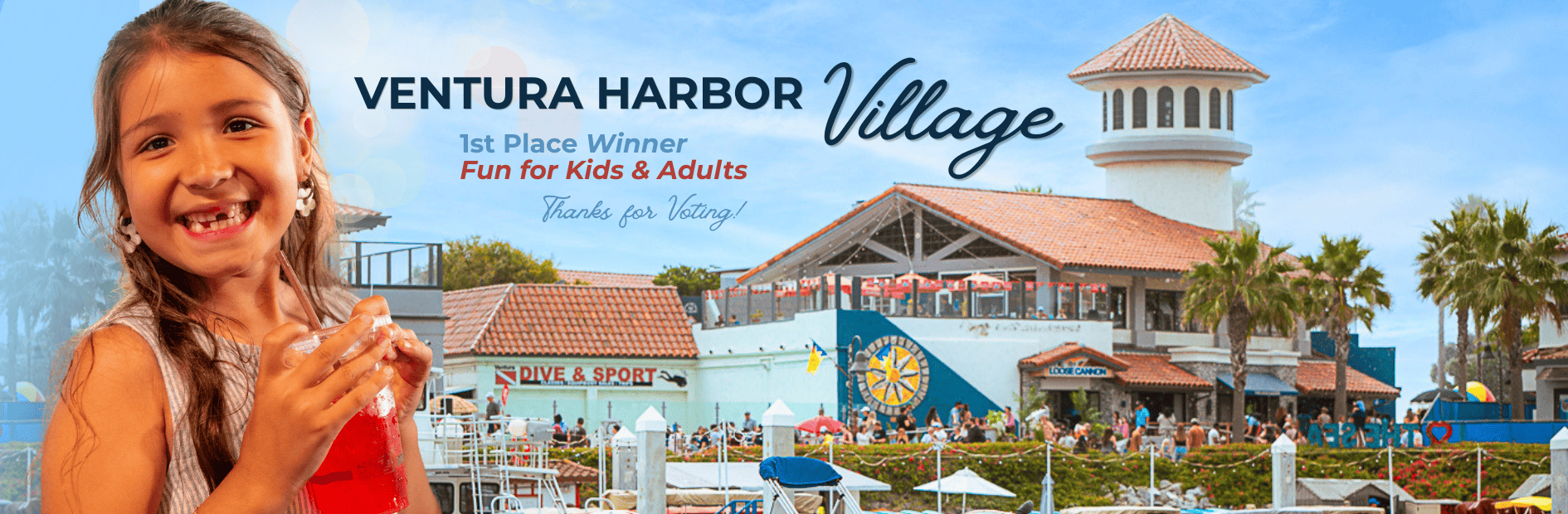 Family enjoying Ventura Harbor Village with shops, boats, and waterfront views.