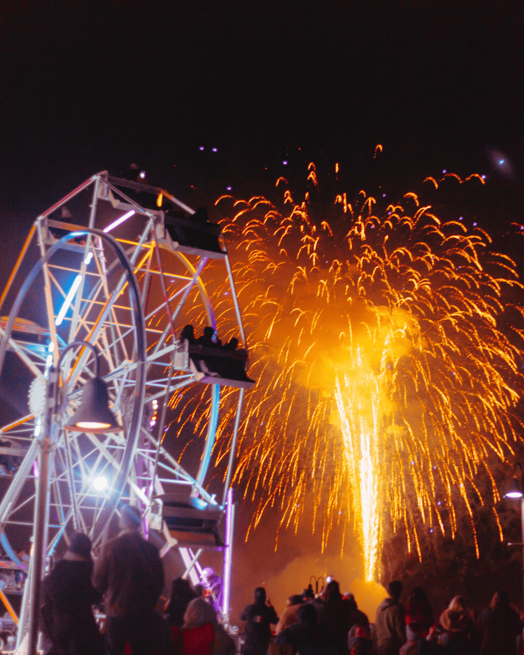 Fireworks illuminate Ventura Harbor Village during Parade of Lights 2026 event.